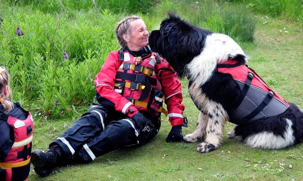 Zoe Spilsbury with one of the Newfoundland dogs during the therapy session at Stanton Lakes in Leicestershire.