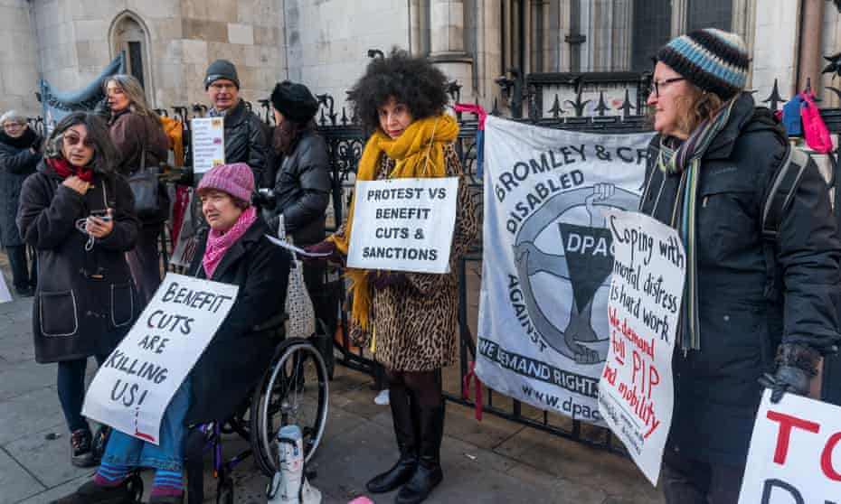 People protest against new Pip rules in London in 2017.
