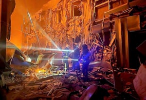 Rescuers work at the site of a Russian missile strike in Odesa, southern Ukraine
