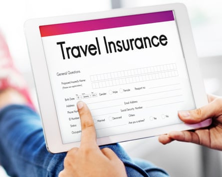 Someone looking at a travel insurance form on a tablet