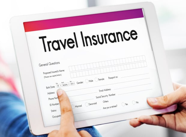 Someone looks at a travel insurance form on a tablet
