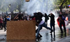 Demonstrators clash with police in Chile