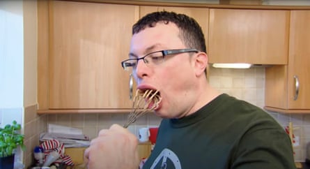 Man puts whisk in his mouth