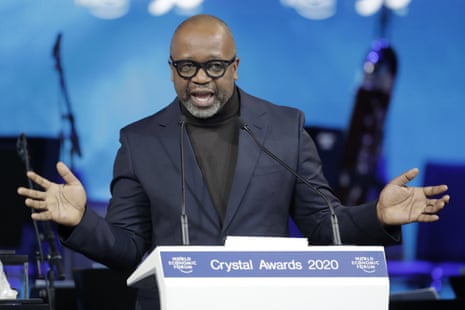 Artist Theaster Gates, from the United States, addresses the audience after receiving a Crystal Award.