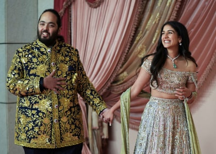 Anant Ambani, son of businessman Mukesh Ambani, arrives with his fiance Radhika Merchant.