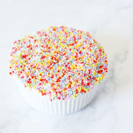 Viral dot cake with rainbow sprinkles on a marble counter3EPJH6E Viral dot cake with rainbow sprinkles on a marble counter