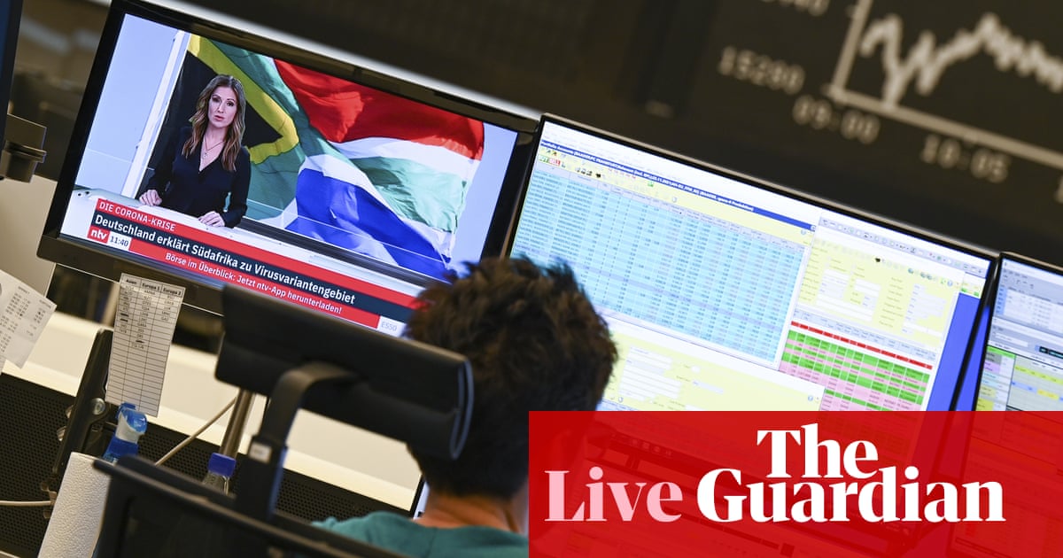 FTSE 100 and Wall Street tumble as Covid variant fears hit stocks and oil – business live - The Guardian