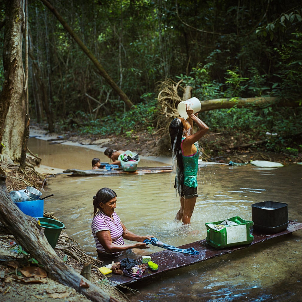 Munduruku women bathe and do laundry