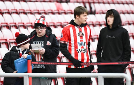 A quartet of young Sunderland fans take up position at the Stadium of Light.