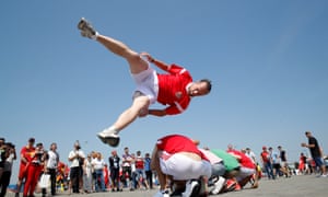 Tunisia fans perform a bit of acrobatics.