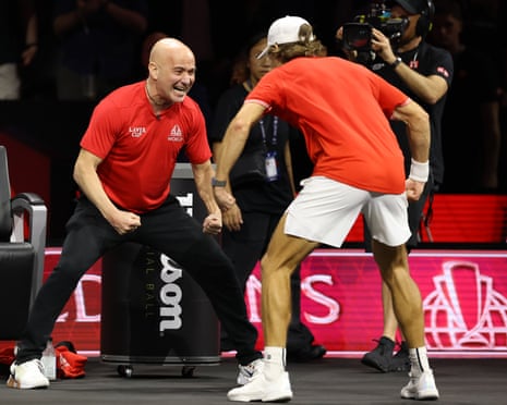 Alex de Minaur (right) celebrates with his Team World captain Andre Agassi after beating Team Europe's Alexander Zverev on day two of the Laver Cup in London.