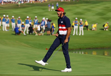 USA’s Max Homa celebrates after holing his putt on the 18th hole to win his match during the singles