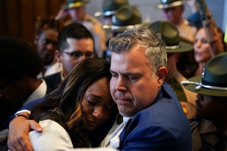 Democratic Senator London Lamar of Memphis and Democratic Tennessee State Representative Jason Powell embrace on the day of the passage of the new congressional map.