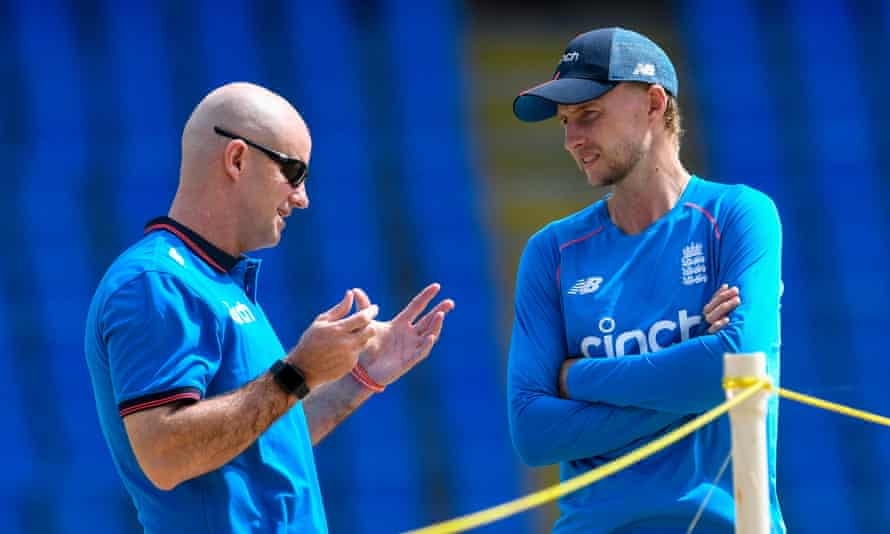 Andrew Strauss (left) and Joe Root of England speak during a training session ahead of the first Test between West Indies and England at Vivian Richards Cricket Stadium in Antigua and Barbuda.