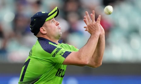 Ireland’s Fionn Hand catches out England batsman Dawid Malan