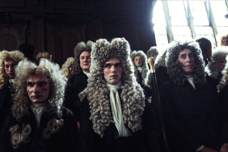 Hoult (centre) as Harley in The Favourite.