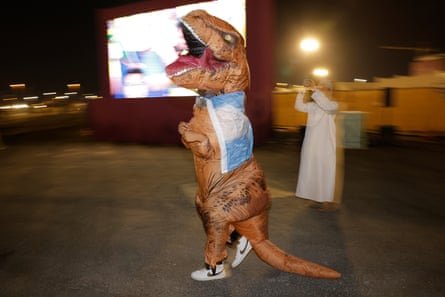 An Argentine fan dressed as a dinosaur, dances outside Lusail stadium when they saw Brazil had been knocked out of the World Cup after losing their quarter-final to Croatia 4-2 on penalties.