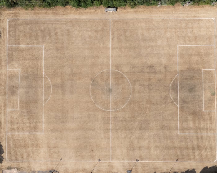 Scratch of the day: local football season postponed due to ‘rock hard’ pitches — image supplied by The Guardian UK's feed