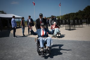 The second world war veteran Kenneth Smith in a wheelchair raising his hands in celebration