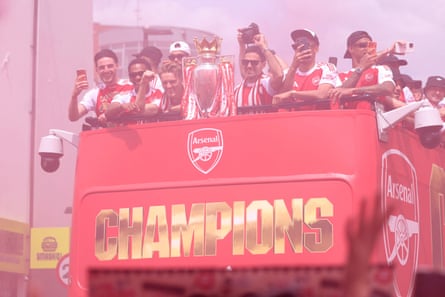 Arsenal team parade on open-top bus