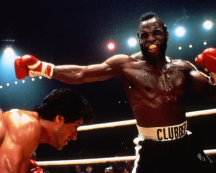 Mr T as Clubber Lang, throwing a punch at Rocky in a boxing ring