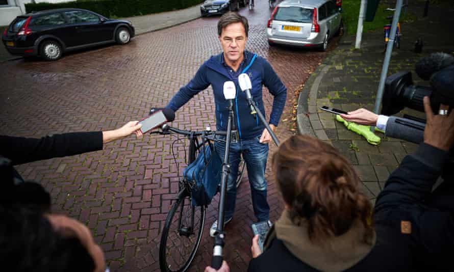 The Dutch prime minister, Mark Rutte, speaks to reporters in The Hague on Sunday