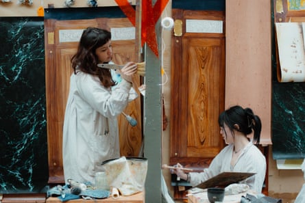 Two students at work on their panels at the Van der Kelen.