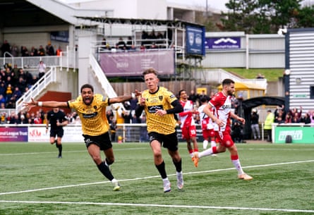 Sam Corne celebrates after scoring from the penalty spot