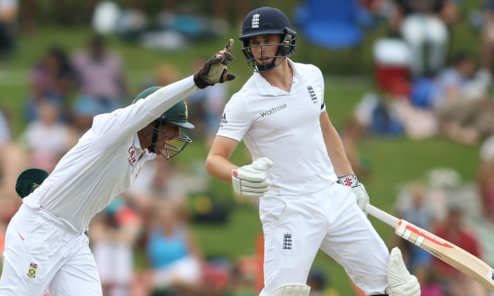 England’s startled Chris Woakes was caught batting too defensively as a jubilant Quinton de Kock runs past.