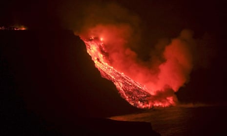 Lava flow from the Cumbre Vieja volcanic eruption in La Palma reaching the sea