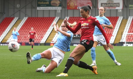 Christen Press gets in a cross against Manchester City. The teams meet again in the League Cup on Thursday.