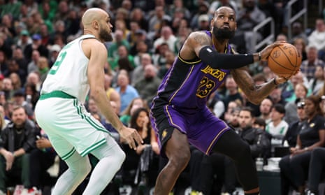 LeBron James exits with left groin injury as Tatum powers Celtics past Lakers | NBA | The Guardian