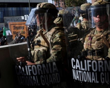 Members of the national guardian stand blocking an entrance to the Federal Building in downtown Los Angeles.