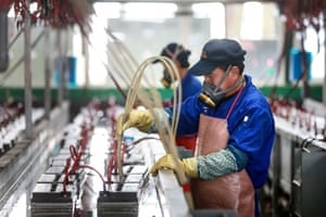 An employee working on a battery production line at a factory in Huaibei in China’s eastern Anhui province yesterday.