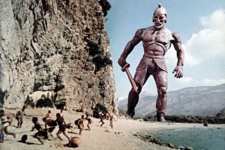 Movie still showing Talos chasing the Argonauts on the beach