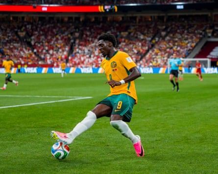 Socceroos striker Mo Touré controls the ball during a World Cup match against Turkey