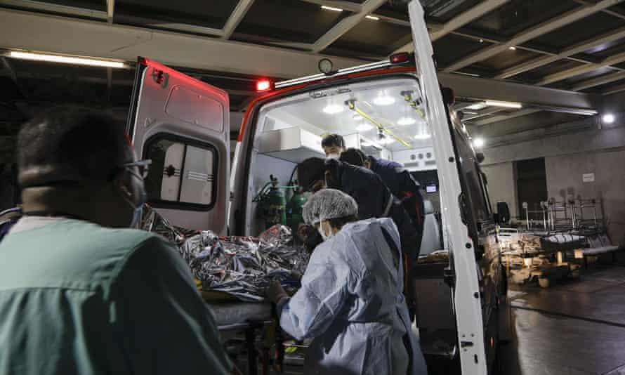 A man suspected of having Covid-19 is transferred by a mobile emergency care service to Hospital das Clínicas, São Paulo, Brazil.