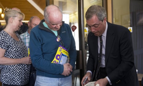 UKIP leader Nigel Farage signs books after a public meeting in Sandwich, Kent.