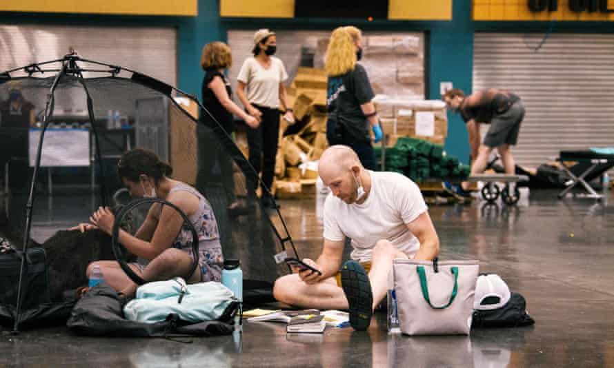 People resting at a cooling station during a heatwave in Portland, Oregon, June 2021