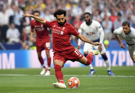 Mohamed Salah scores a penalty in the second minute of Liverpool’s 2-0 win against Tottenham in the Champions League final