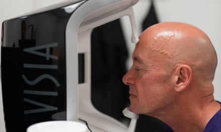 Phil Daoust has his complexion examined using the Visia skin-analysis machine.