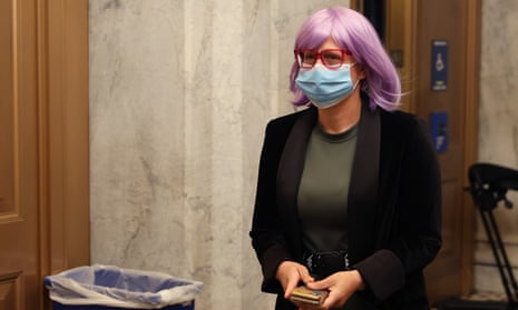 Kyrsten Sinema arrives at the US Capitol on 18 May 2020 sporting a bright purple wig.