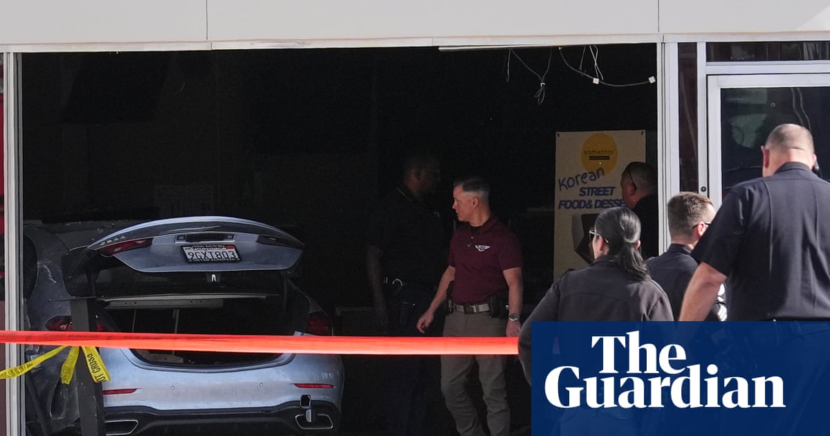Three dead and six hurt after driver hits cyclist and crashes car into LA grocery store