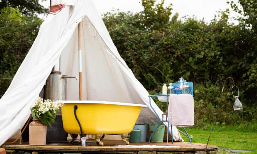 Soak up the great outdoors from the bath at Little Links at Devon Yurt, available through Canopy and Stars.