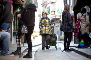 Shoppers on narrow street