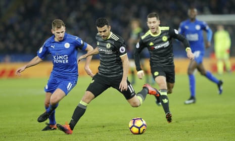 Pedro takes on Marc Albrighton during Chelsea’s 3-0 victory over Leicester at the King Power Stadium.