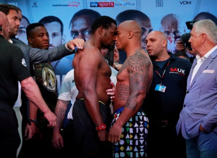 Dean Whyte looks on from the left of brother Dillian before a recent weigh-in.