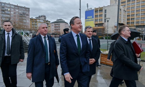 Britain’s foreign minister, David Cameron, at a memorial to fallen British soldiers in Pristina during his first visit to Kosovo