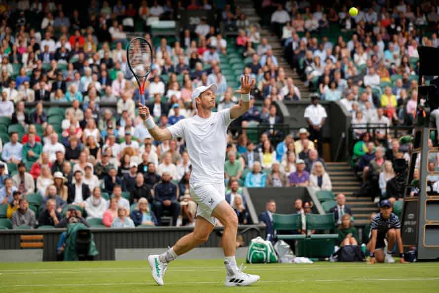 Britain’s Andy Murray returns the ball to Australia’s James Duckworth.