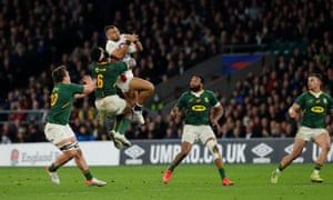 Siya Kolisi of South Africa is yellow carded for this tackle on Joe Marchant of England